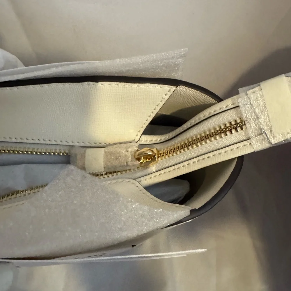 kate spade Cream Tote with Decorative Cutouts and Scarf Accent